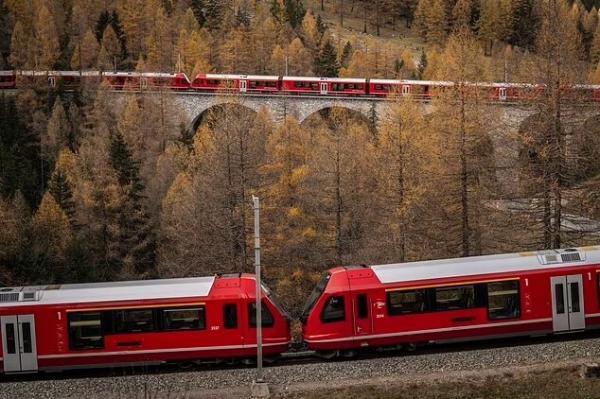 طولانی ترین قطار مسافربری دنیا ، منظره ها خیره کننده کوه های آلپ سوئیس را ببینید